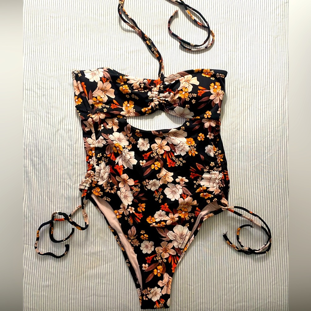 Shade & Shore black and floral one piece. Small.